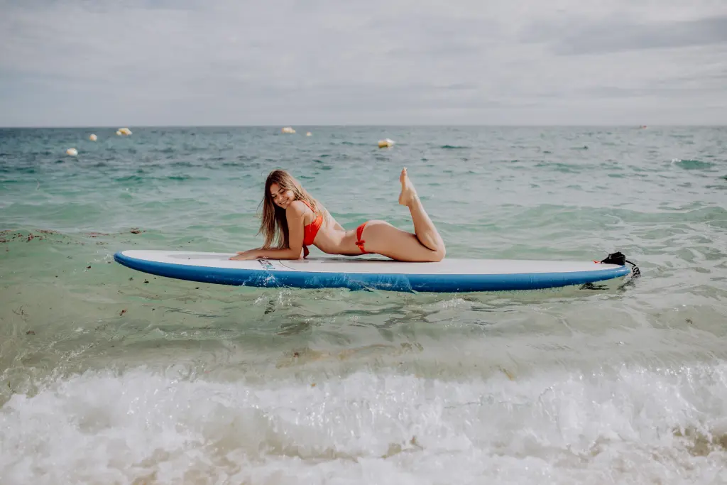 young-beautiful-woman-relaxing-sea-sup-board.jpg